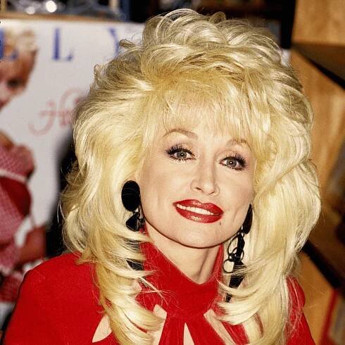 Dolly Parton wears bold red lipstick 
