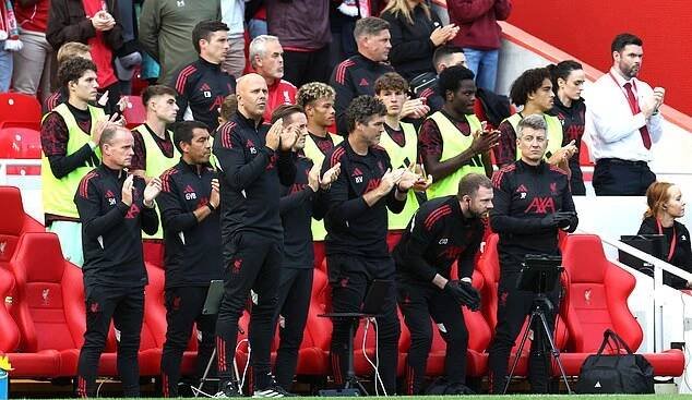 Liverpool's Dutch manager Arne Slot takes part in an applause at the 20th minute in honour of the Liverpool's late Portuguese striker #20 Diogo Jota, during the first of two pre season friendly football matches between Liverpool and Athletic Bilbao at Anfield in Liverpool, north west England on August 4, 2025. (Photo by Darren Staples / AFP) (Photo by DARREN STAPLES/AFP via Getty Images)