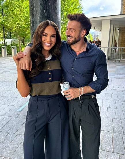 Vicky Pattison and Sam Thompson smiling together.