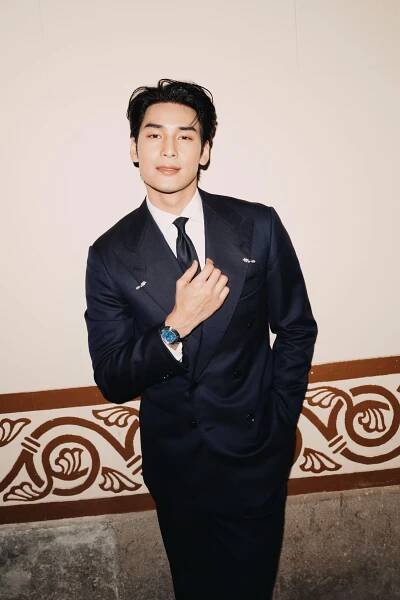 Image may contain Tony Yang Clothing Formal Wear Suit Blazer Coat Jacket Face Head Person and Photography