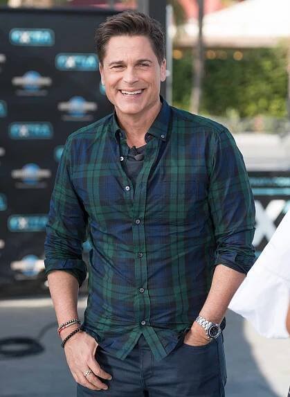 Rob Lowe Visits "Extra"