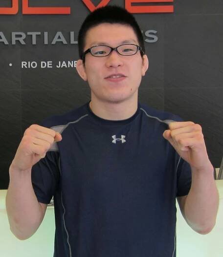 Shinya Aoki, a dominating force in Mixed Martial Arts, posing in his 2011 Evolve MMA Gear. Wallpaper