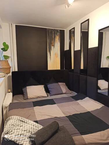 Postel nebo postele na pokoji v ubytování Studio Park Śląski Katowice/Chorzów