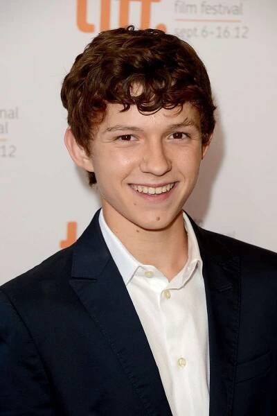 TORONTO, ON - SEPTEMBER 09: Actor Tom Holland arrives at "The Impossible" Premiere at the 2012 Toronto International Film Festival at the Princess of Wales Theatre on September 9, 2012 in Toronto, Canada. 