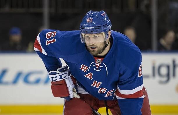 New York Rangers left wing Rick Nash #61 waits for the puck to drop.