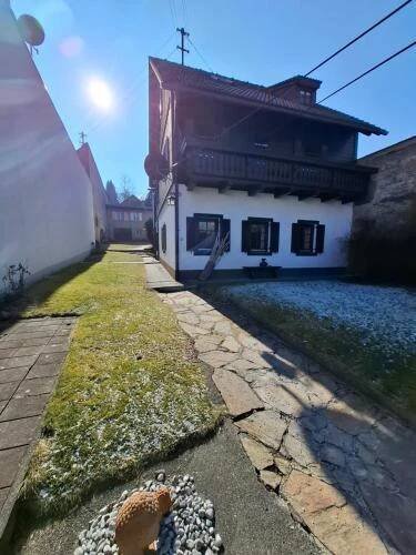 a house with a stone pathway in front of it at Ferienhaus Stadt Juwel in Mürzzuschlag