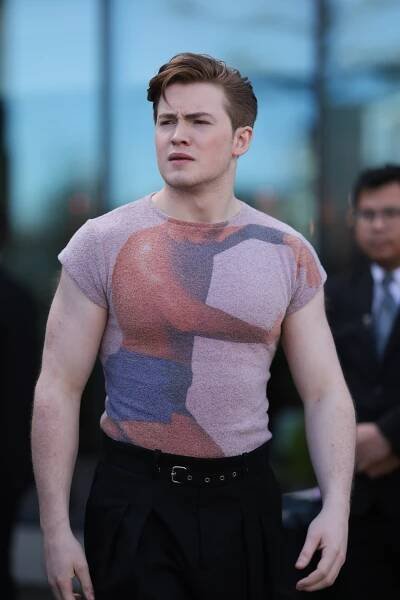 Kit walking outside