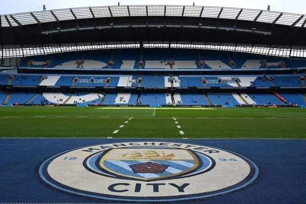 The empty stadium is seen ahead of the English Premier League football match between Manchester City and Liverpool at the Etihad Stadium in Manchester, north west England, on April 1, 2023. (Photo by Paul ELLIS / AFP) / RESTRICTED TO EDITORIAL USE. No use with unauthorized audio, video, data, fixture lists, club/league logos or 'live' services. Online in-match use limited to 120 images. An additional 40 images may be used in extra time. No video emulation. Social media in-match use limited to 120 images. An additional 40 images may be used in extra time. No use in betting publications, games or single club/league/player publications. /  (Photo by PAUL ELLIS/AFP via Getty Images)