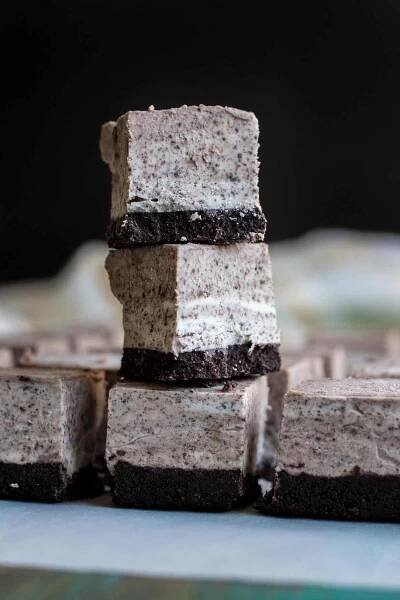 A stack of no bake oreo cheesecake bites.