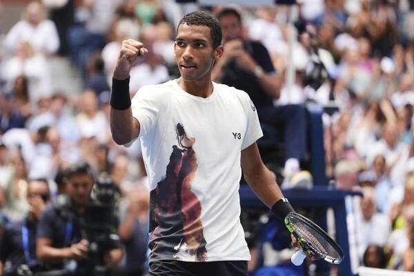 Felix Auger-Aliassime, of Canada, celebrates after winning a match in the fourth round of the US Open tennis championships on Monday, Sept. 1, 2025, in New York.