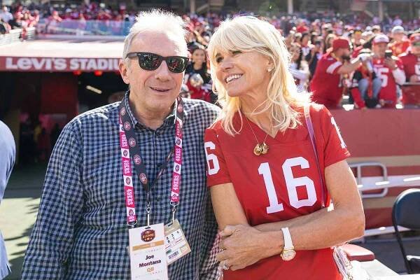 Joe Montana and his wife Jennifer Wallace before the NFL professional football game between the Kansas City Chiefs and San Francisco 49ers