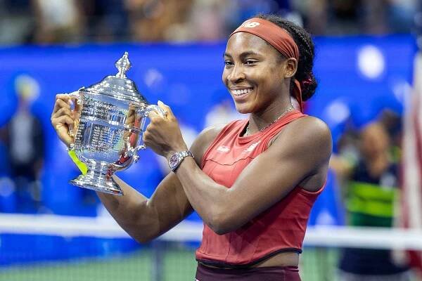 Coco Gauff of the United States with the winner's trophy after her victory against Aryna Sabalenka of Belarus in the Women's Singles Final on Arthur Ashe Stadium during the US Open Tennis Championship 2023 at the USTA National Tennis Centre on September 9th, 2023 in Flushing, Queens, New York City.