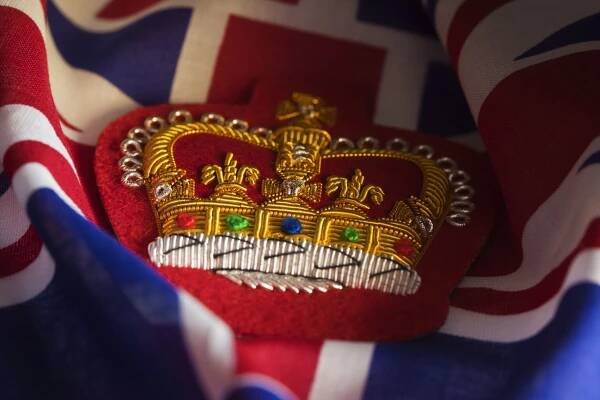 Vyšívaný odznak Queens Crown a Union Jack stock fotka