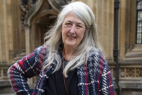 Professor Mary Beard was forced to strip down to her "scrappy undies" at Heathrow Airport, she said on Twitter.