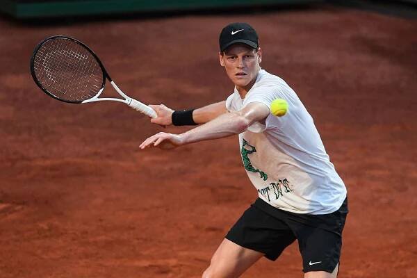 Italy's Jannik Sinner plays a forehand return during a training session at Foro Italico on May 05, 2025 in Rome, Italy.