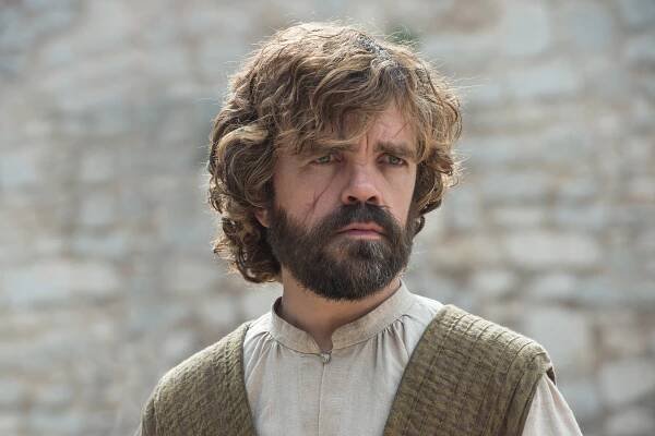 Tyrion Lannister in Game of Thrones showing a large scar on his face