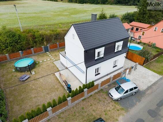 Rodinný dům 4+1 s garáží a zahradou, Zabrušany, obrázek č. 2