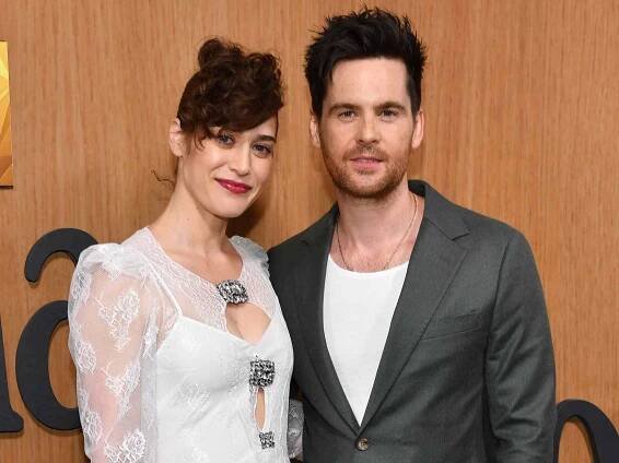 Lizzy Caplan and Tom Riley attend FX's 