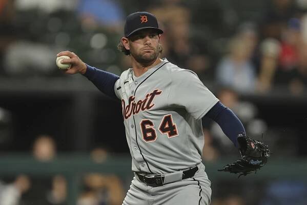 Detroit Tigers baseball player pitching.