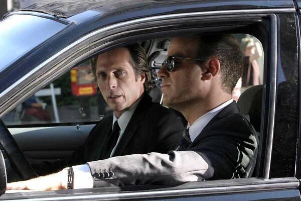 William Fichtner and Paul Adelstein in Prison Break.